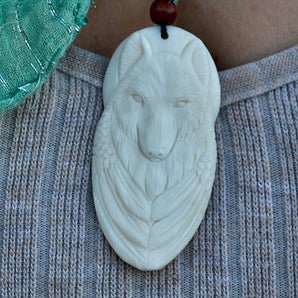 Hand Carved Full moon White Wolf Pendant