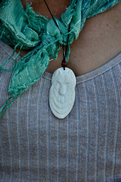 Hand Carved Full moon White Wolf Pendant
