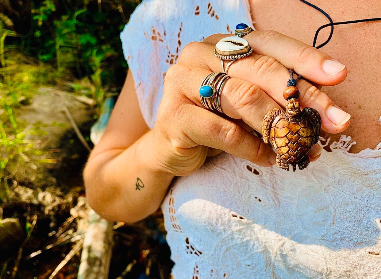 Hand carved jewelry deals