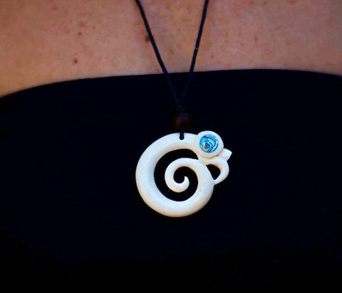 Hand carved bone pendant with Paua shell inlay