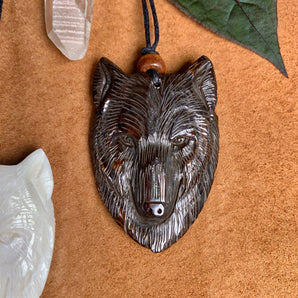 Hand Carved Black Wolf Pendant