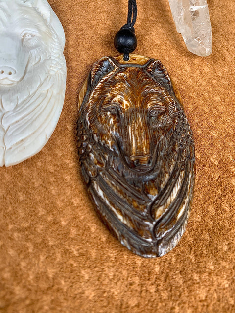 Hand-carved Sacred Full Moon Wolf Pendant