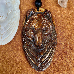 Hand-carved Sacred Full Moon Wolf Pendant